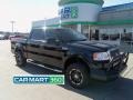 2005 Black Ford F150 Lariat SuperCrew 4x4  photo #1