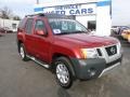 2010 Red Brick Metallic Nissan Xterra SE 4x4  photo #1