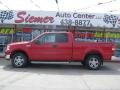 2005 Bright Red Ford F150 XLT SuperCab 4x4  photo #1