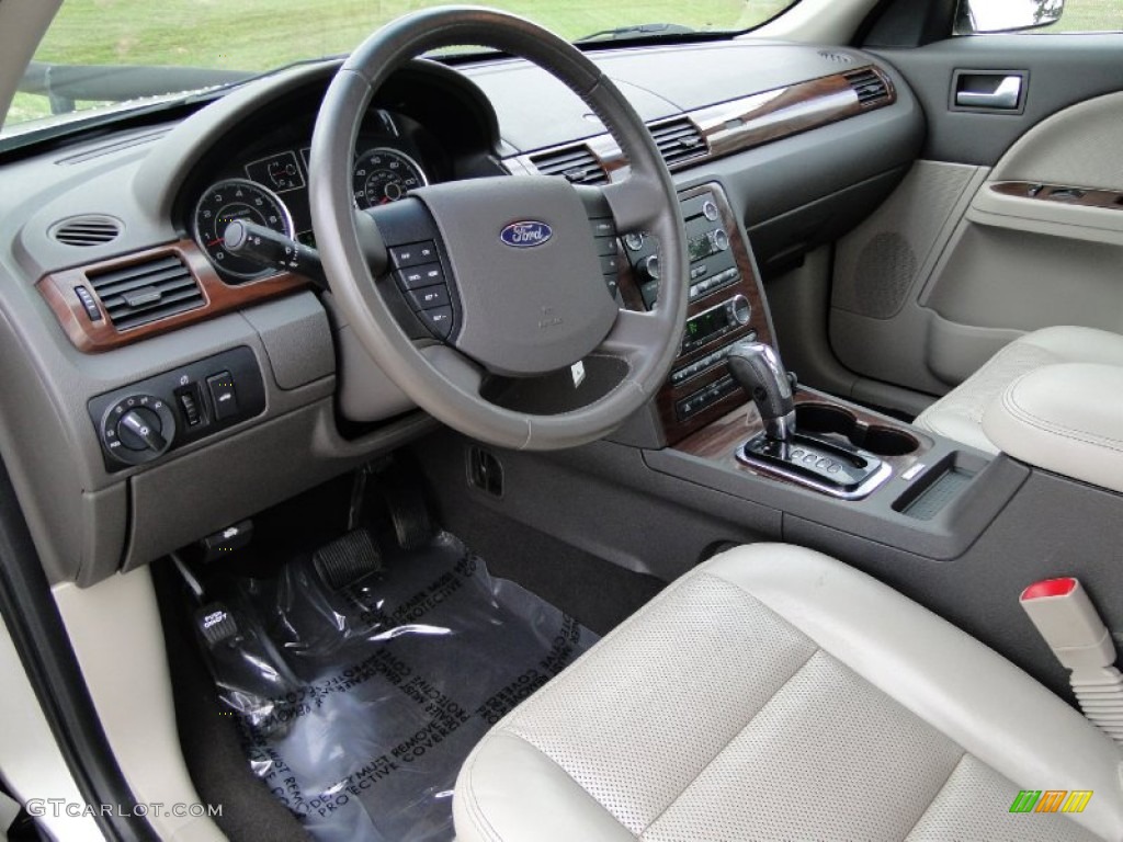2008 Ford Taurus SEL Medium Light Stone Dashboard Photo #62143123