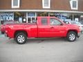 2009 Fire Red GMC Sierra 1500 SLE Extended Cab 4x4  photo #2