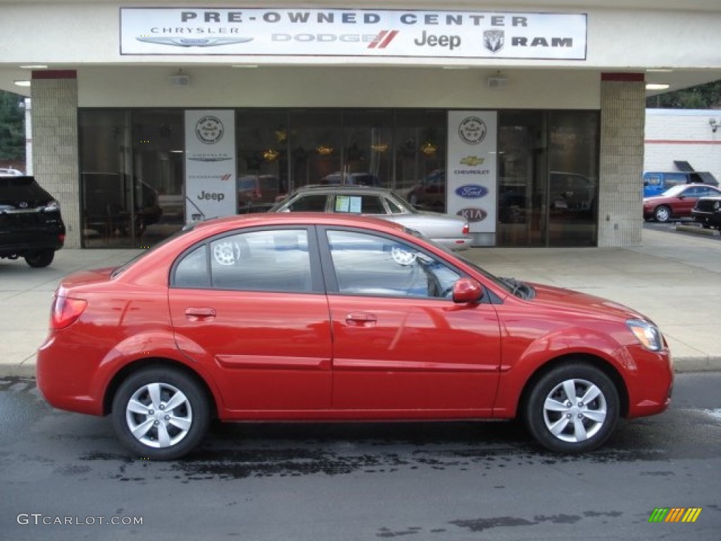 Tropical Red Kia Rio