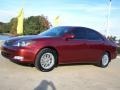 2002 Salsa Red Pearl Toyota Camry SE V6  photo #2
