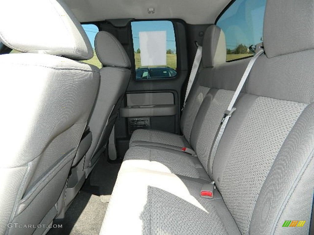 2010 F150 XLT SuperCab - Tuxedo Black / Medium Stone photo #13