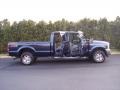 2004 True Blue Metallic Ford F250 Super Duty Lariat Crew Cab 4x4  photo #40