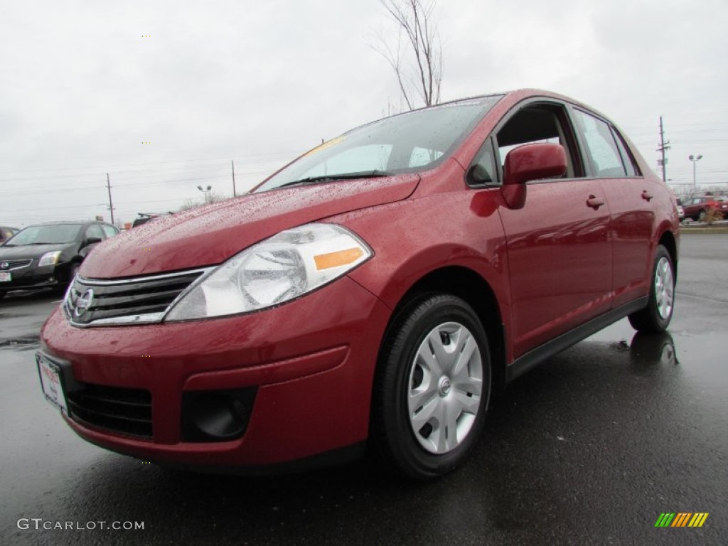 2010 Versa 1.8 S Sedan - Red Brick Metallic / Charcoal photo #1