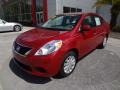 2012 Red Brick Nissan Versa 1.6 SV Sedan  photo #1