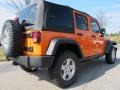 2012 Crush Orange Jeep Wrangler Unlimited Rubicon 4x4  photo #3