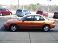 Sunburst Orange Metallic - Cavalier Sedan Photo No. 5