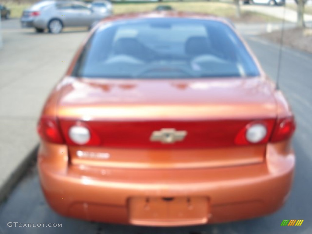2005 Cavalier Sedan - Sunburst Orange Metallic / Graphite Gray photo #7