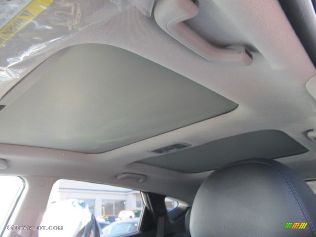 2012 Tucson Limited AWD - Diamond Silver / Black photo #6