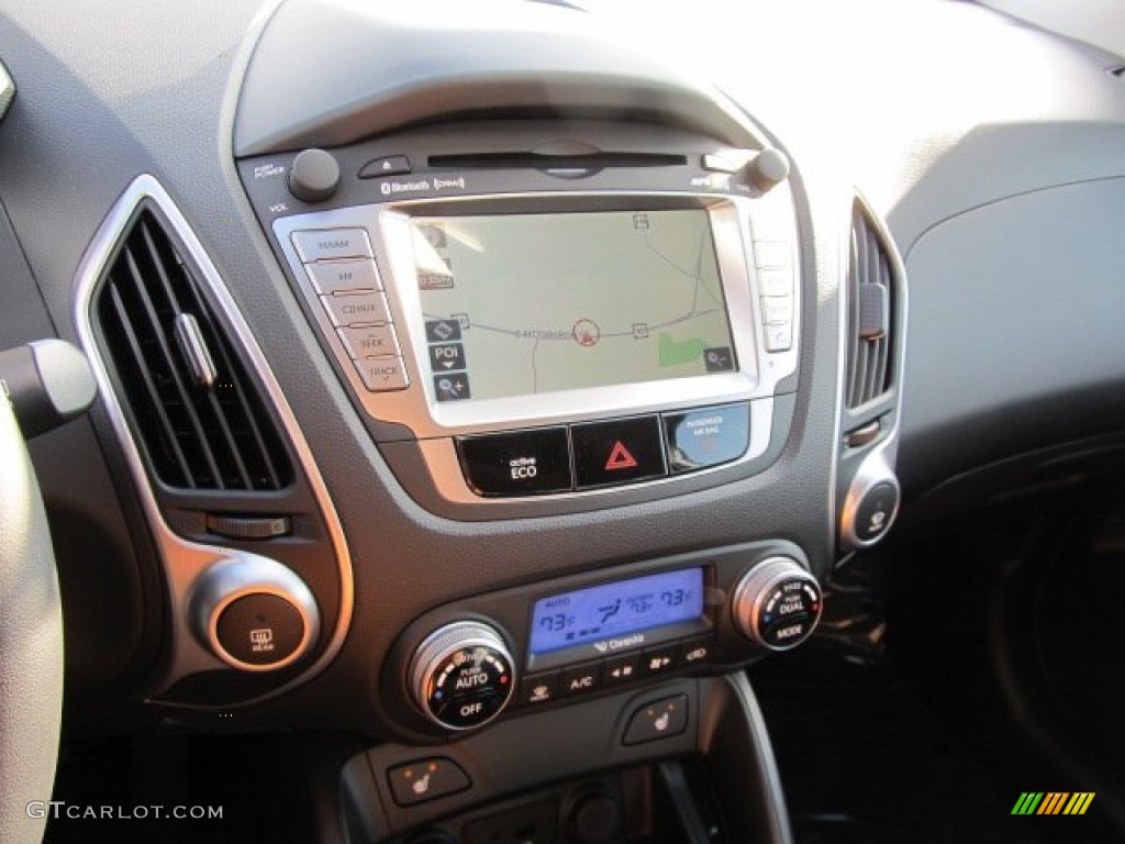 2012 Tucson Limited AWD - Diamond Silver / Black photo #8