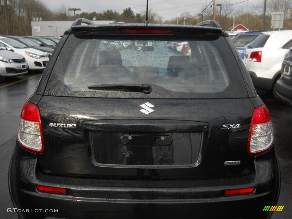 2009 SX4 Crossover Touring AWD - Black Pearl Metallic / Black photo #13