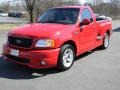 Bright Red 2000 Ford F150 SVT Lightning Exterior