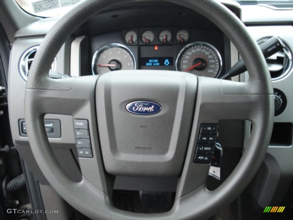 2010 Ford F150 XLT SuperCrew 4x4 Medium Stone Steering Wheel Photo #62385668