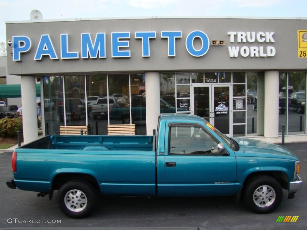Bright Teal Metallic GMC Sierra 1500