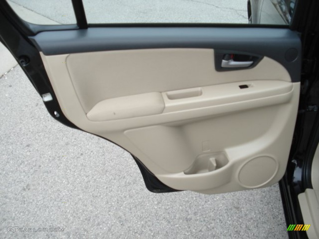2010 Suzuki SX4 Sedan Beige Door Panel Photo #62419911