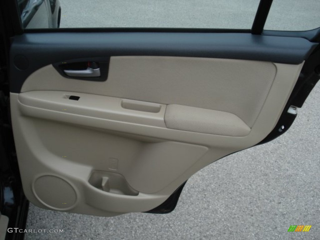 2010 Suzuki SX4 Sedan Beige Door Panel Photo #62419929