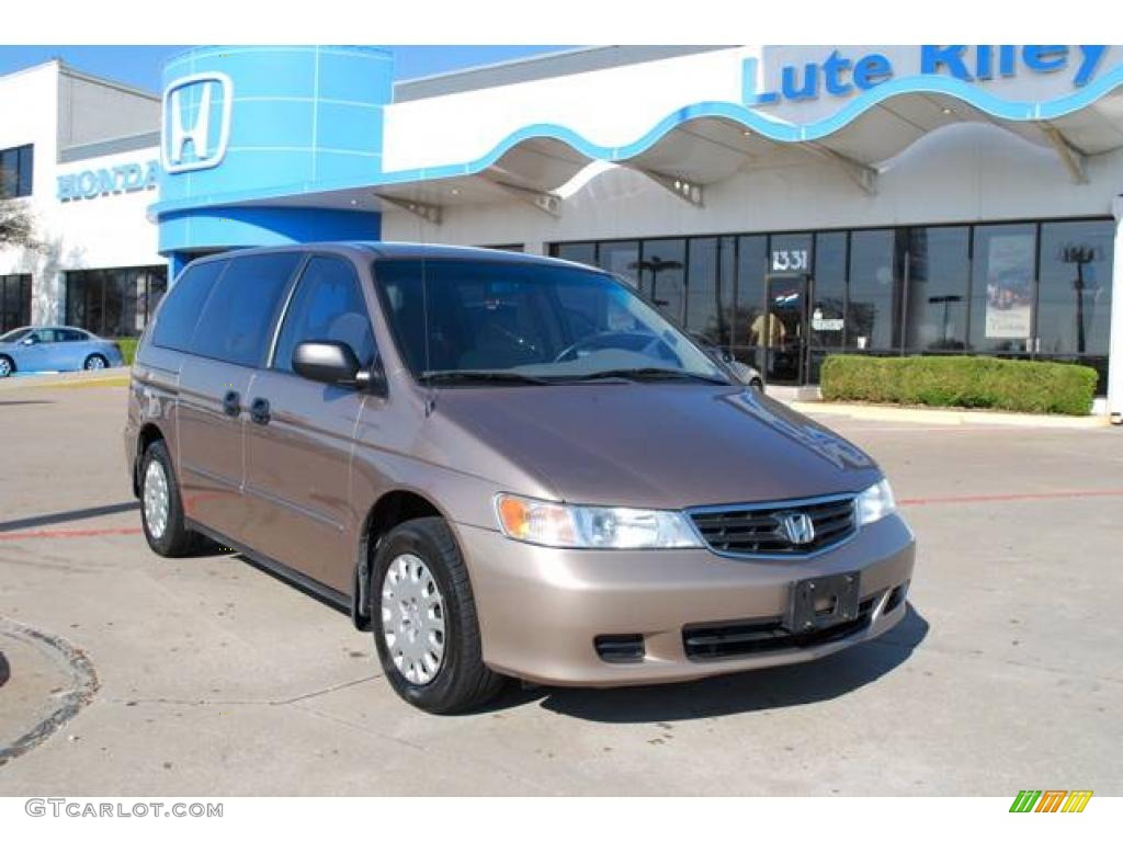 Sandstone Metallic Honda Odyssey