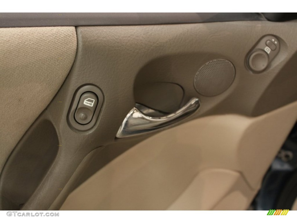 2003 L Series LW300 Wagon - Medium Blue / Light Tan photo #6