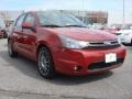 2010 Sangria Red Metallic Ford Focus SES Sedan  photo #1