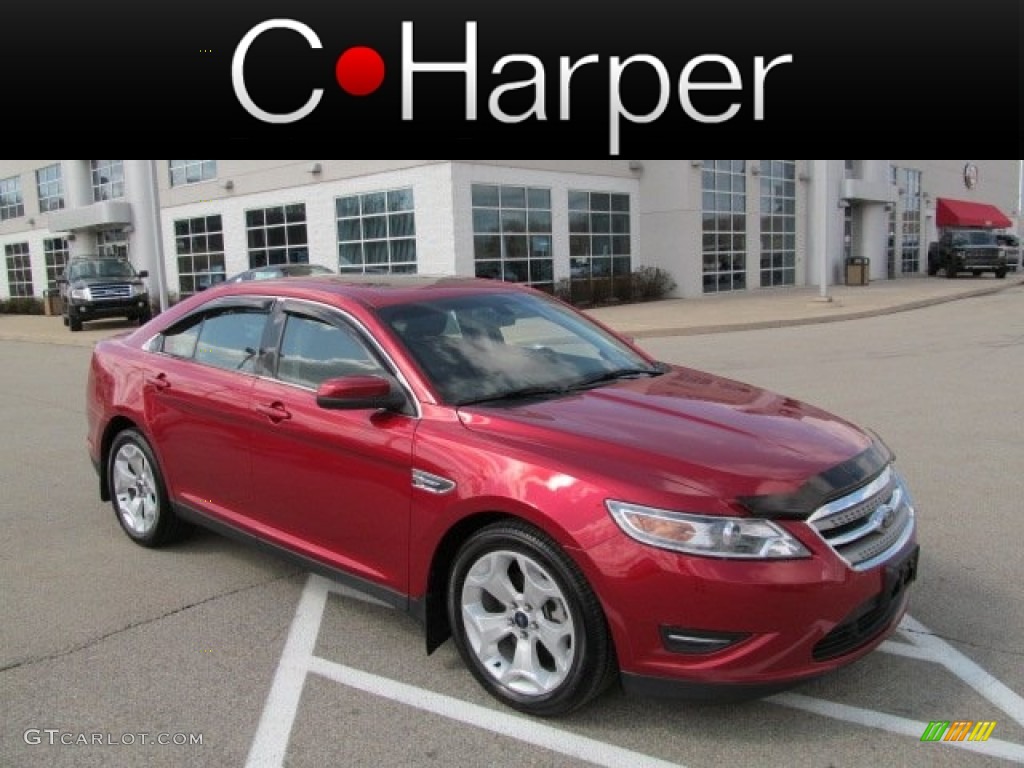2010 Taurus SEL - Red Candy Metallic / Charcoal Black photo #1