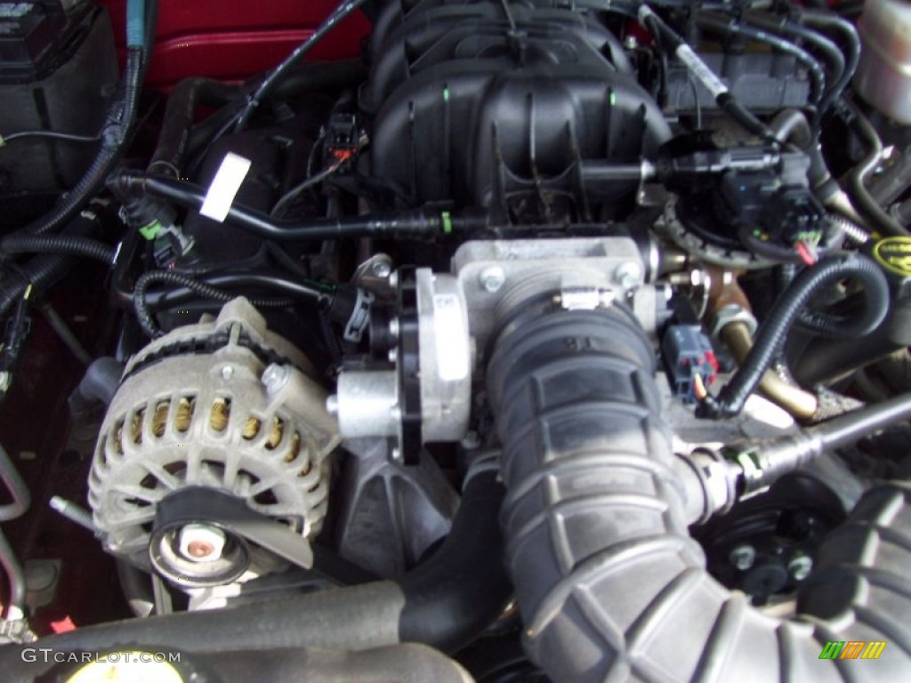 2007 Mustang V6 Deluxe Coupe - Redfire Metallic / Dark Charcoal photo #13