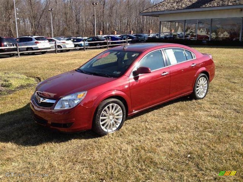 2009 Aura XR V6 - Red Jewel Tintcoat / Tan photo #3