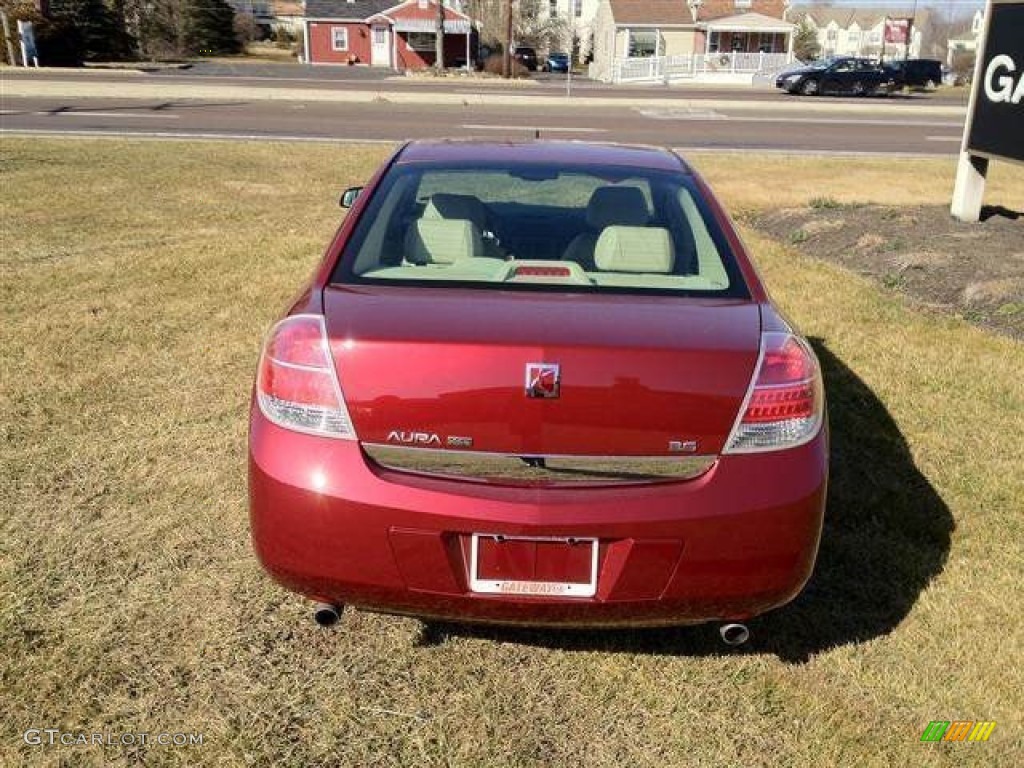 2009 Aura XR V6 - Red Jewel Tintcoat / Tan photo #5