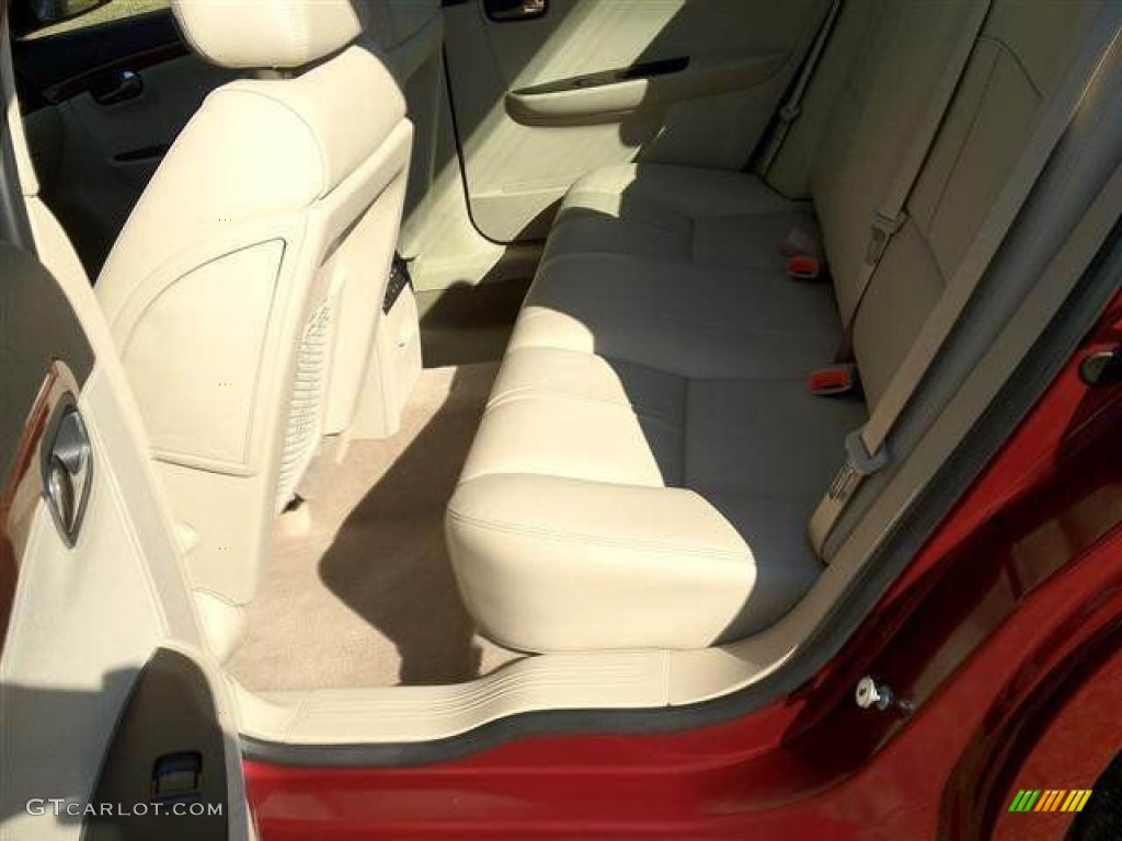2009 Aura XR V6 - Red Jewel Tintcoat / Tan photo #6
