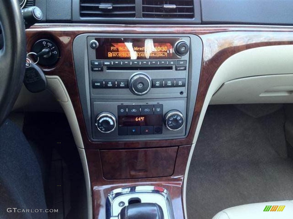 2009 Aura XR V6 - Red Jewel Tintcoat / Tan photo #10