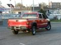 2004 Fire Red GMC Sierra 2500HD SLT Crew Cab 4x4  photo #4