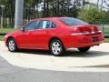 2010 Victory Red Chevrolet Impala LS  photo #6