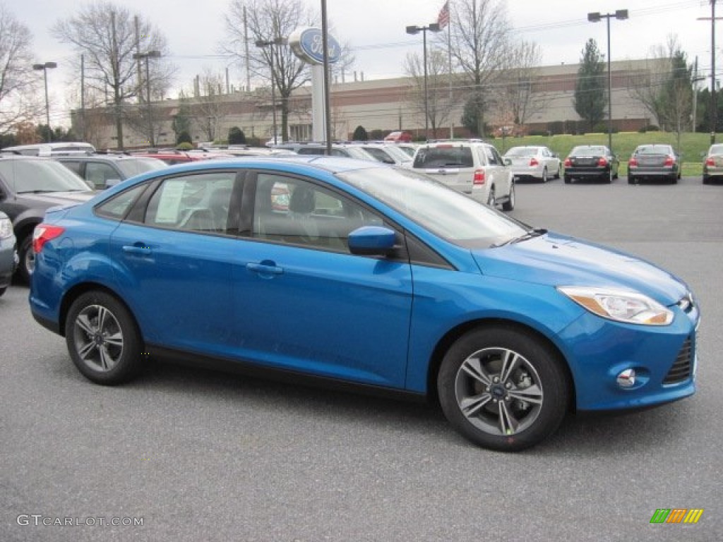 2012 Focus SE Sport Sedan - Blue Candy Metallic / Two-Tone Sport photo #1