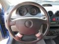Gray 2004 Chevrolet Aveo Hatchback Steering Wheel