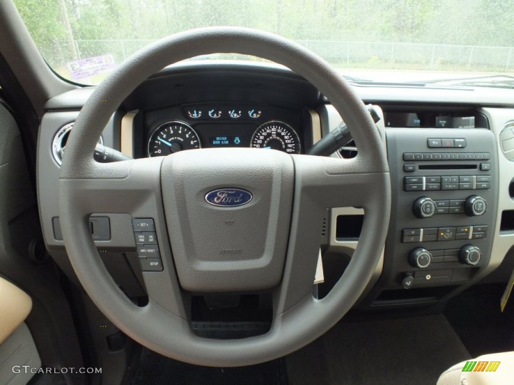 2011 Ford F150 XLT SuperCab Pale Adobe Steering Wheel Photo #62601761