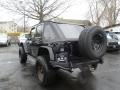 2010 Jeep Wrangler Unlimited Sport 4x4 Right Hand Drive Wheel and Tire Photo