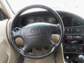 2001 Kia Sephia Beige Interior Steering Wheel Photo