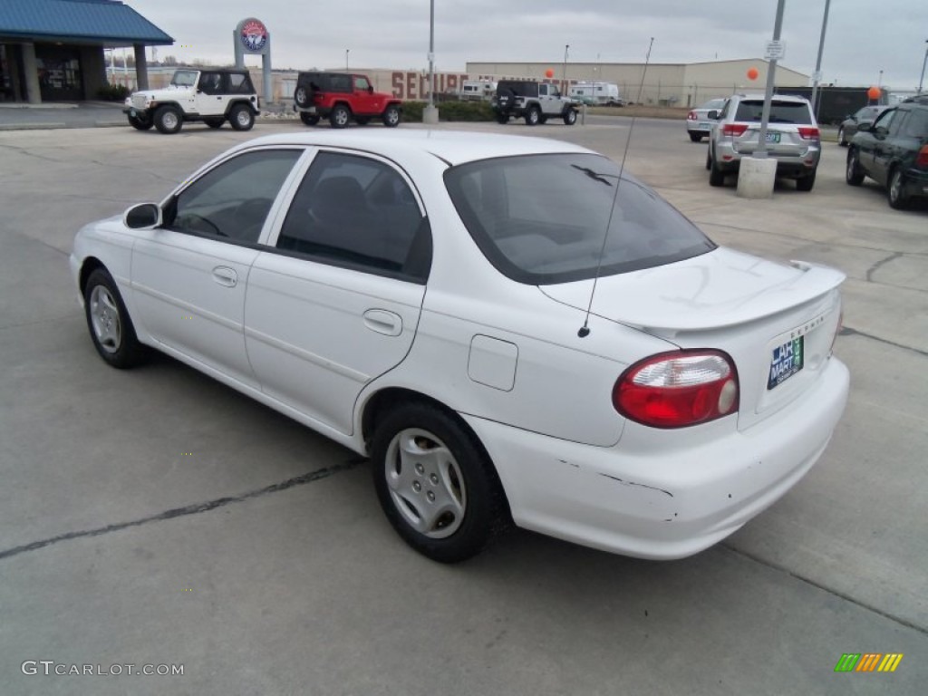 2001 Sephia  - White / Beige photo #18