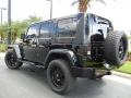 2010 Jeep Wrangler Unlimited Sport 4x4 Right Hand Drive Wheel and Tire Photo