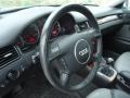 2004 Audi Allroad Platinum/Saber Black Interior Steering Wheel Photo