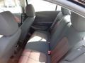 2012 Chevrolet Sonic Jet Black/Brick Interior Rear Seat Photo