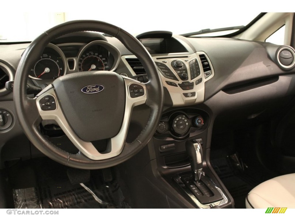 2011 Ford Fiesta SEL Sedan Cashmere/Charcoal Black Leather Dashboard Photo #62866700