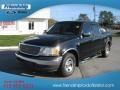 2002 Black Ford F150 XLT SuperCrew  photo #2