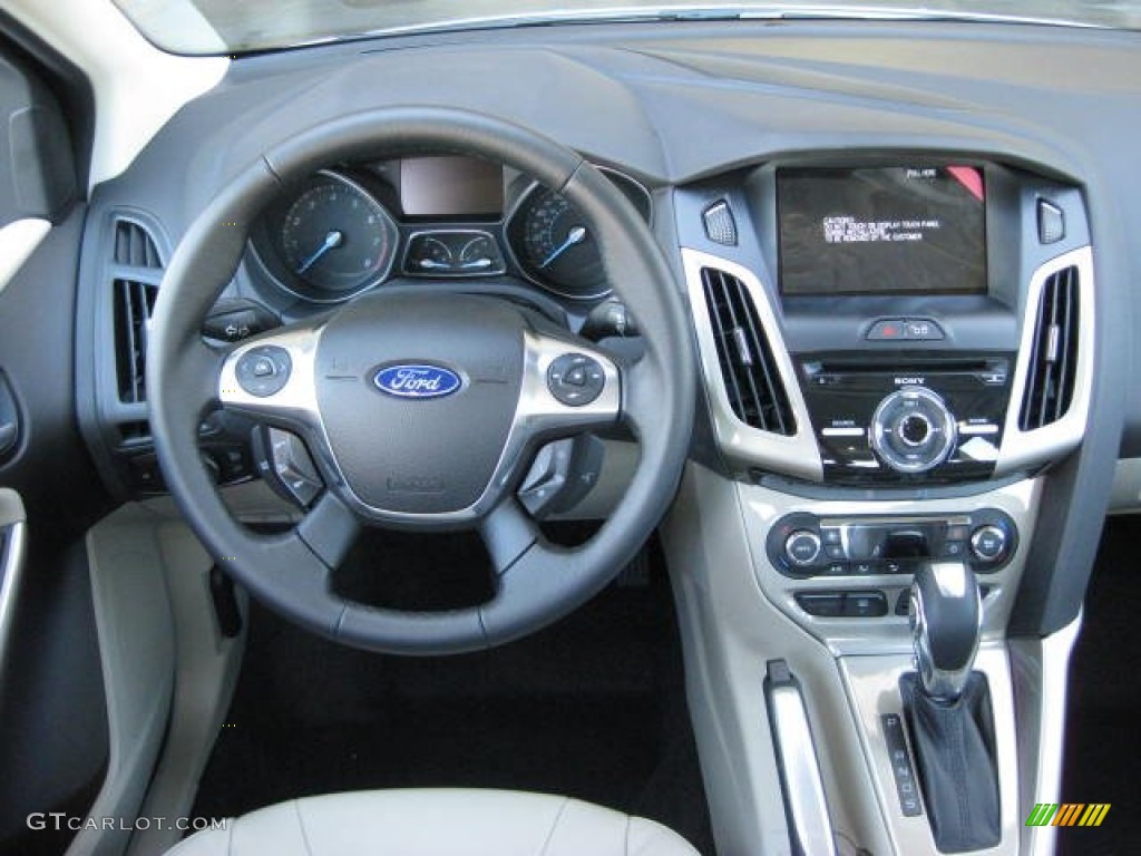 2012 Focus SEL Sedan - White Platinum Tricoat Metallic / Stone photo #19