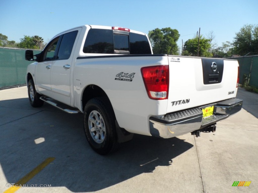 2004 Titan SE Crew Cab 4x4 - White / Graphite/Titanium photo #5