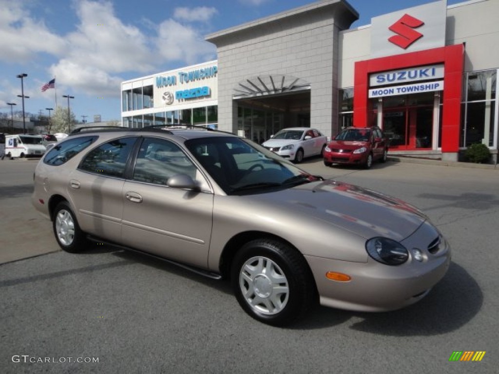 1999 Taurus SE Wagon - Light Prairie Tan Metallic / Medium Prairie Tan photo #1