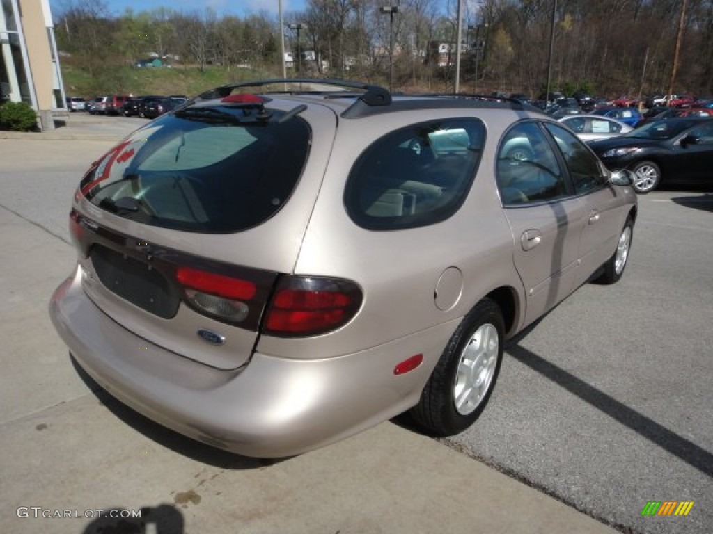 Light Prairie Tan Metallic 1999 Ford Taurus SE Wagon Exterior Photo #62969055