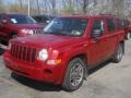 2010 Inferno Red Crystal Pearl Jeep Patriot Sport 4x4  photo #1