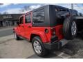 2010 Flame Red Jeep Wrangler Unlimited Sahara 4x4  photo #2